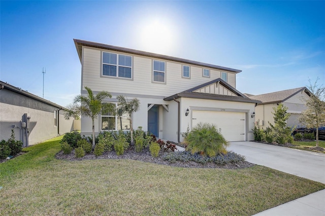 view of front of home with a front lawn and a garage