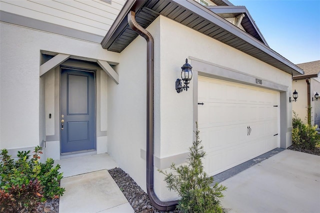 entrance to property with a garage