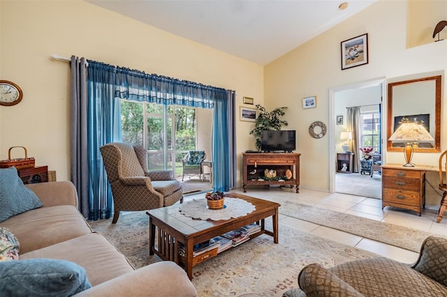 living room with a healthy amount of sunlight and light tile floors