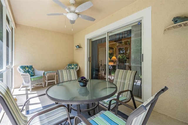 view of terrace featuring ceiling fan