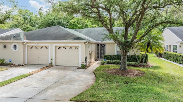 ranch-style home featuring a front yard and a garage