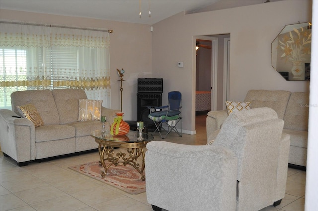 living room featuring light tile flooring