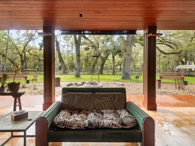 view of patio featuring a fire pit