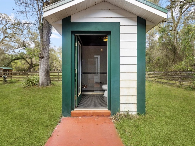 view of outdoor structure with fence