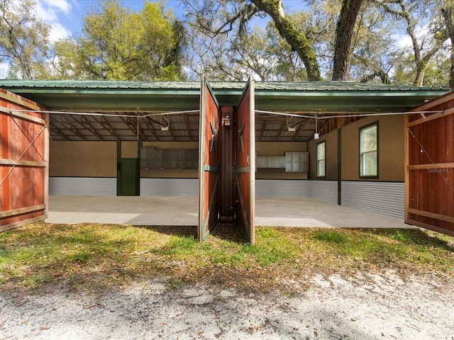 view of patio / terrace featuring an outbuilding