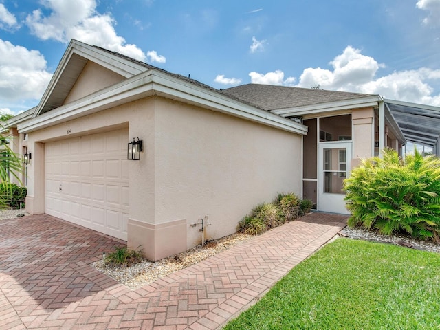 view of home's exterior with a garage