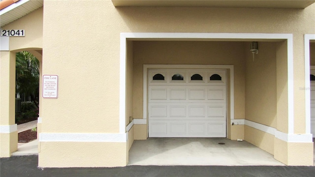 property entrance featuring a garage