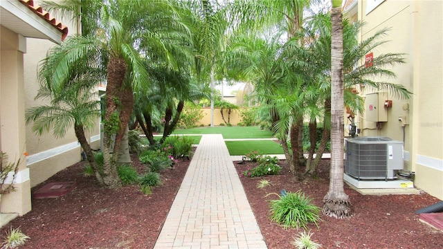 view of yard with central AC