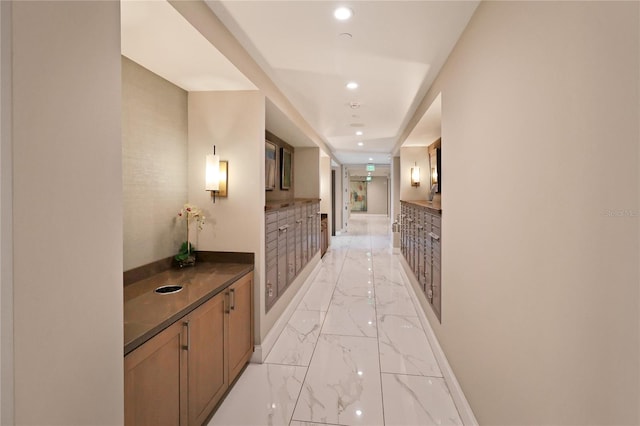 hall with light tile patterned flooring