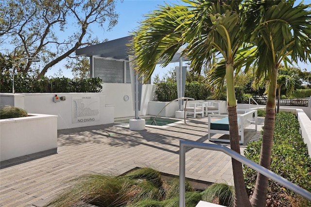 view of patio with a wooden deck