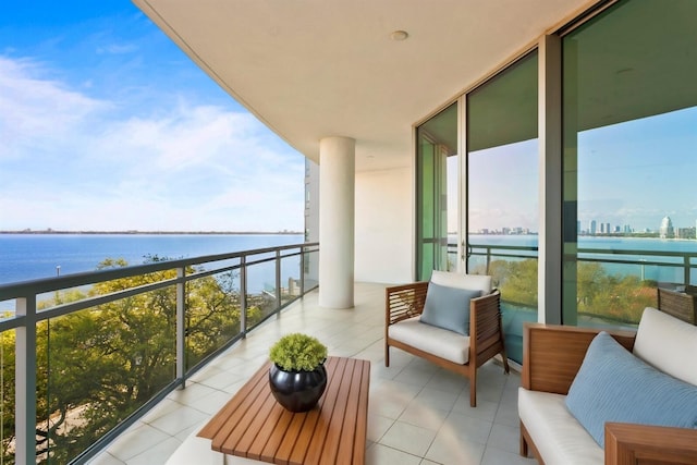 balcony featuring a water view