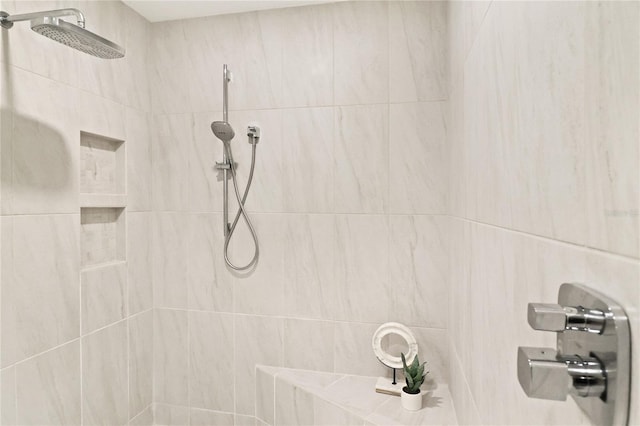 details with a tile shower