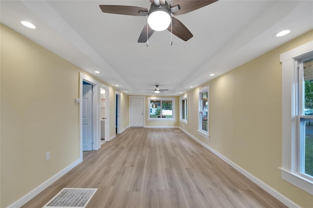 empty room featuring light hardwood / wood-style floors and ceiling fan