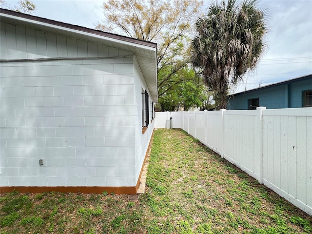 view of property exterior featuring a yard