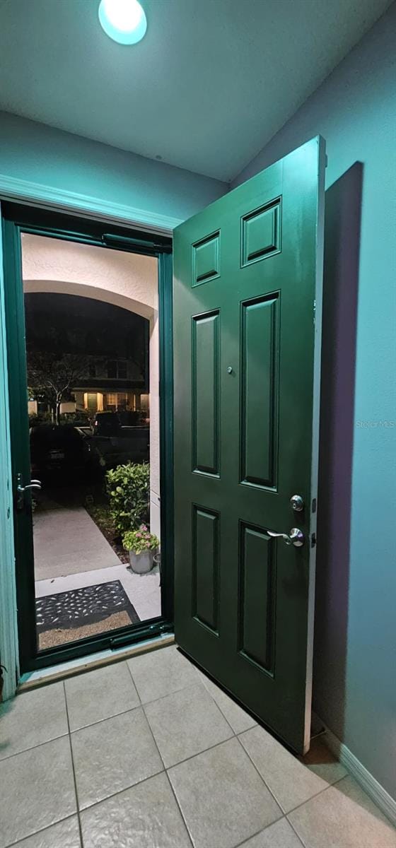 view of tiled foyer entrance