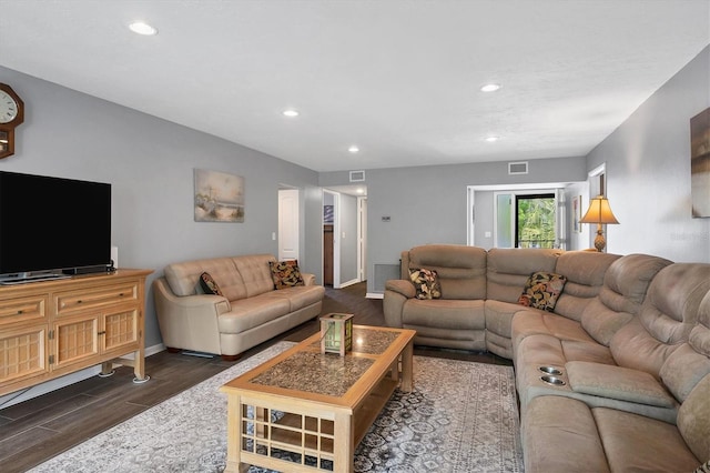 living room featuring dark wood-type flooring