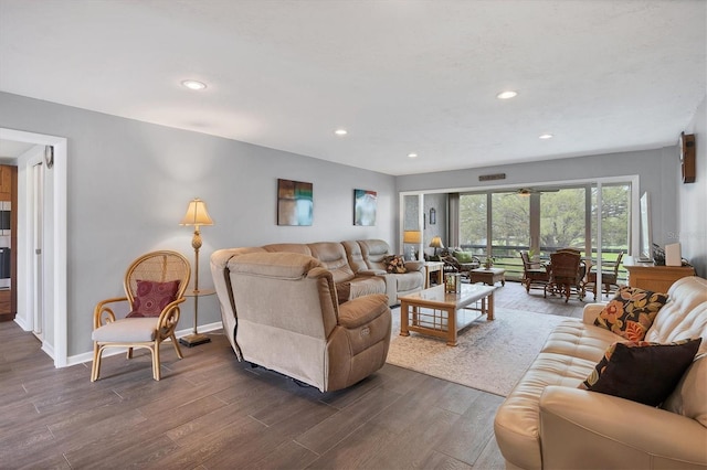 living room with dark hardwood / wood-style flooring