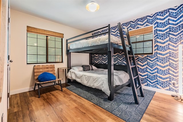 bedroom featuring hardwood / wood-style flooring