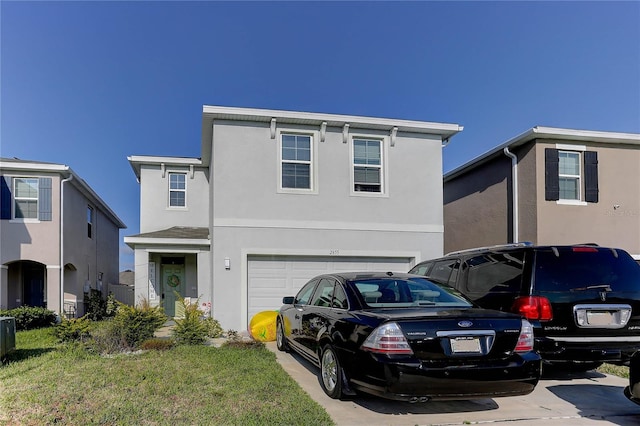 view of front of home with a garage