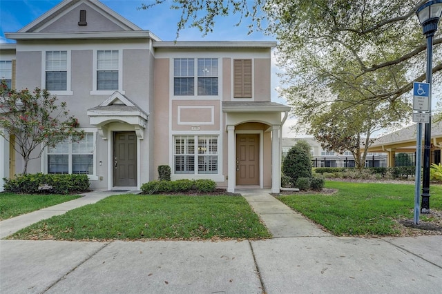 view of front of home with a front yard