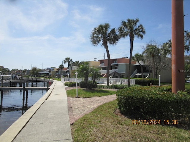 exterior space with a water view