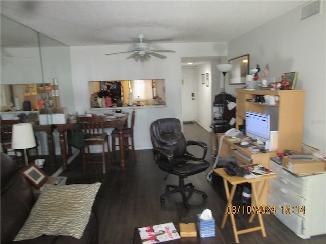 office area featuring ceiling fan and dark hardwood / wood-style flooring