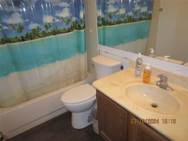 full bathroom with shower / bath combination with curtain, toilet, vanity, and wood-type flooring