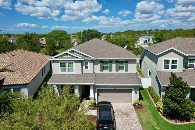 view of front of property featuring a garage