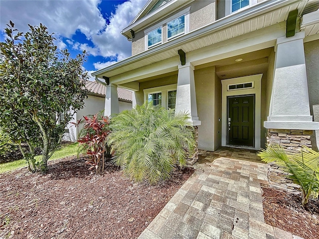 entrance to property with a porch