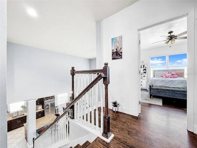 corridor featuring hardwood / wood-style floors