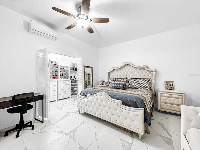 tiled bedroom with ceiling fan and a wall unit AC