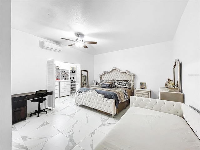 tiled bedroom featuring ceiling fan and an AC wall unit