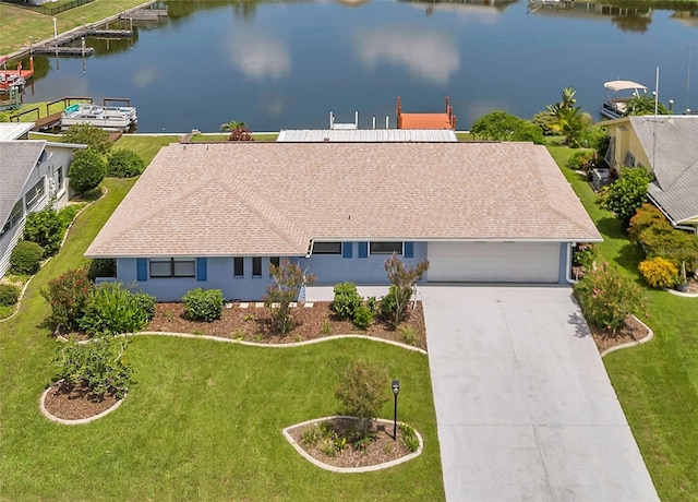 birds eye view of property featuring a water view