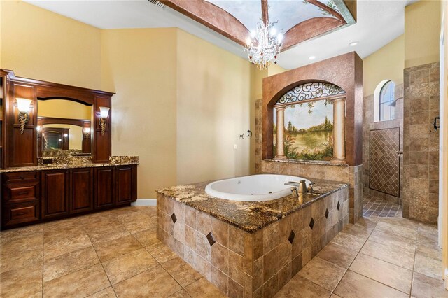 bathroom featuring vanity, independent shower and bath, a chandelier, and tile flooring