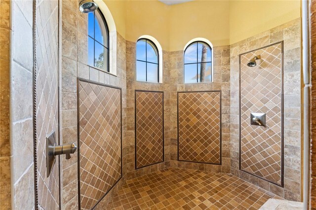 bathroom featuring tiled shower