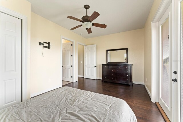 bedroom featuring ceiling fan and dark wood-type flooring