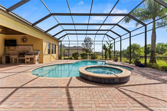 view of pool featuring a patio area, area for grilling, and a lanai