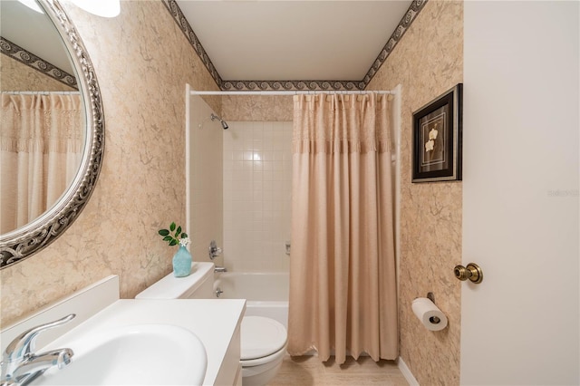 full bathroom featuring shower / bath combination with curtain, toilet, and vanity