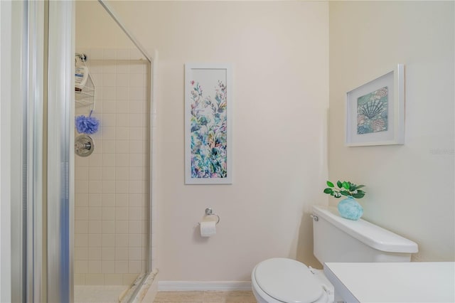 bathroom featuring walk in shower, toilet, and vanity