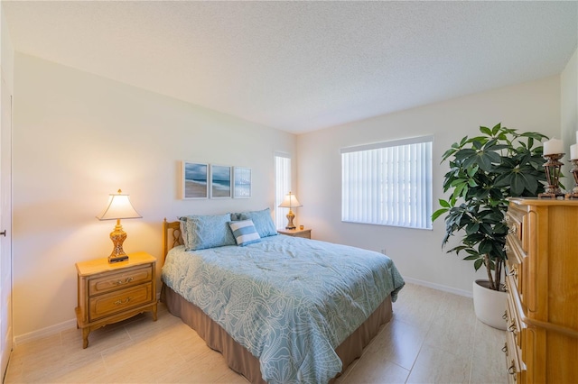 bedroom with a textured ceiling