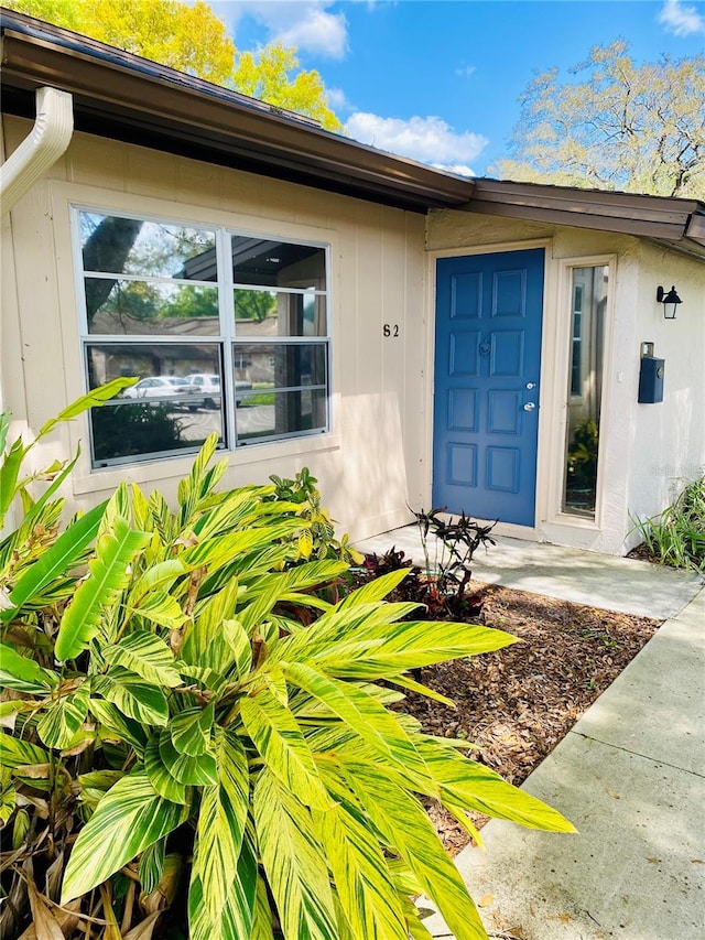 doorway to property featuring a patio