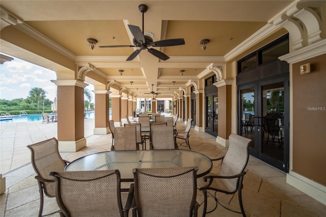 view of patio with french doors and ceiling fan