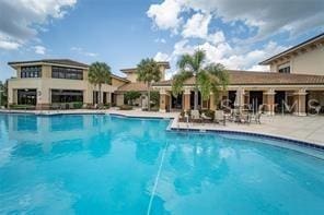 view of swimming pool with a patio