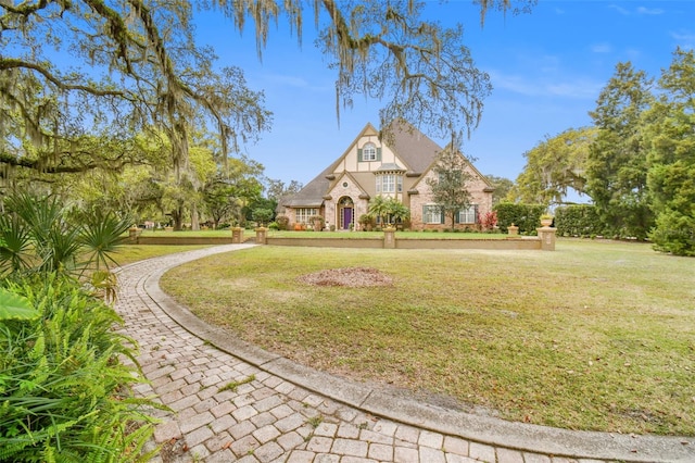 view of front of property with a front lawn