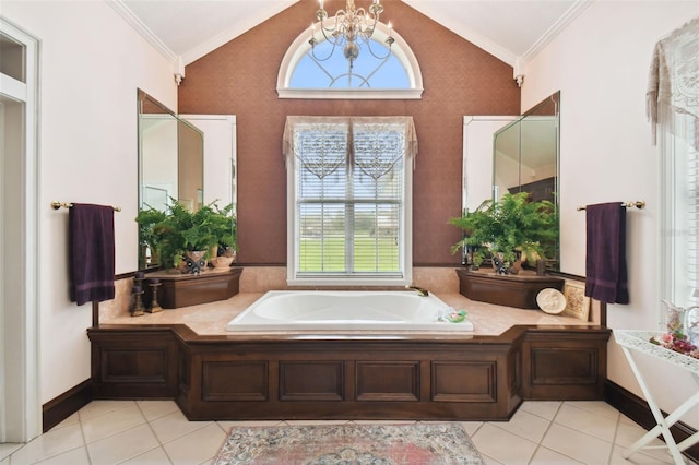 bathroom with a washtub, crown molding, lofted ceiling, and an inviting chandelier