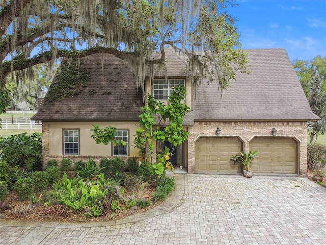 view of front of home with a garage