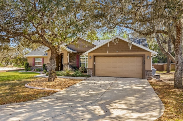 view of front of home featuring a front yard and a garage