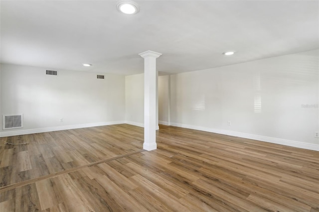 basement featuring light wood-type flooring