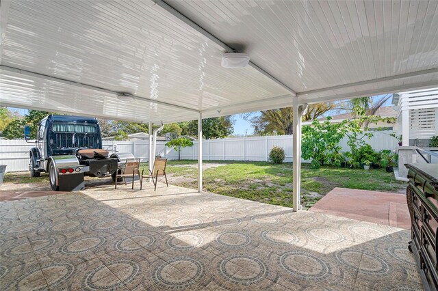 view of patio / terrace with a shed