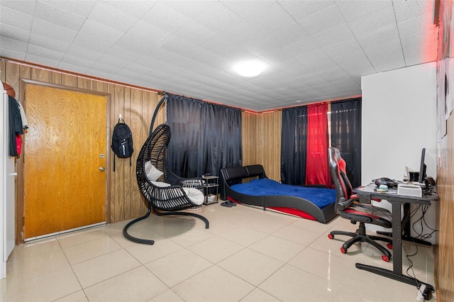 tiled bedroom with wooden walls